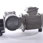 Industrial electric motor with gearbox, close-up on white, in Prestons, New South Wales, Australia.