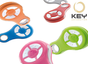 Multi-colour KEY Automation keyring remotes for automatic gates, shown by SAMT in Prestons, New South Wales, Australia.