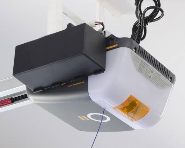 Modern automatic garage door opener with backup battery, installed by SAMT in Australia.