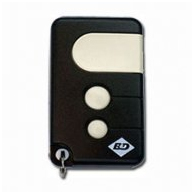 Black garage door remote with white buttons, SAMT Garage & Gate Automation, Prestons, New South Wales, Australia.