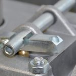 Close-up of gate motor mounting bracket and pinion assembly, essential for secure swing gate motor installation by SAMT in Prestons, Australia.