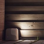 Installed automatic sliding gate motor illuminated at night, SAMT Garage & Gate Automation, Prestons, New South Wales, Australia.