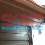 SAMT automatic roller garage door opener installed for secure access in Prestons, New South Wales, Australia.