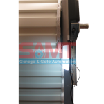 Side-mounted SAMT roller door motor installed on a garage door, garage door services near me, Prestons, Australia.