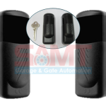 Pair of black automatic gate sensors by SAMT Garage & Gate Automation, with size comparison to a key, in Australia.
