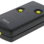 Nice black remote control transmitter with two yellow buttons for automated gates, shown in Prestons, New South Wales, Australia