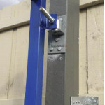 Upper hinge bolt assembly for a blue metal gate attached to a grey steel post, installed in Prestons, New South Wales, Australia