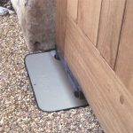 Nice underground swing gate motor installed at a wooden gate by SAMT Garage & Gate Automation in Prestons, New South Wales, Australia.