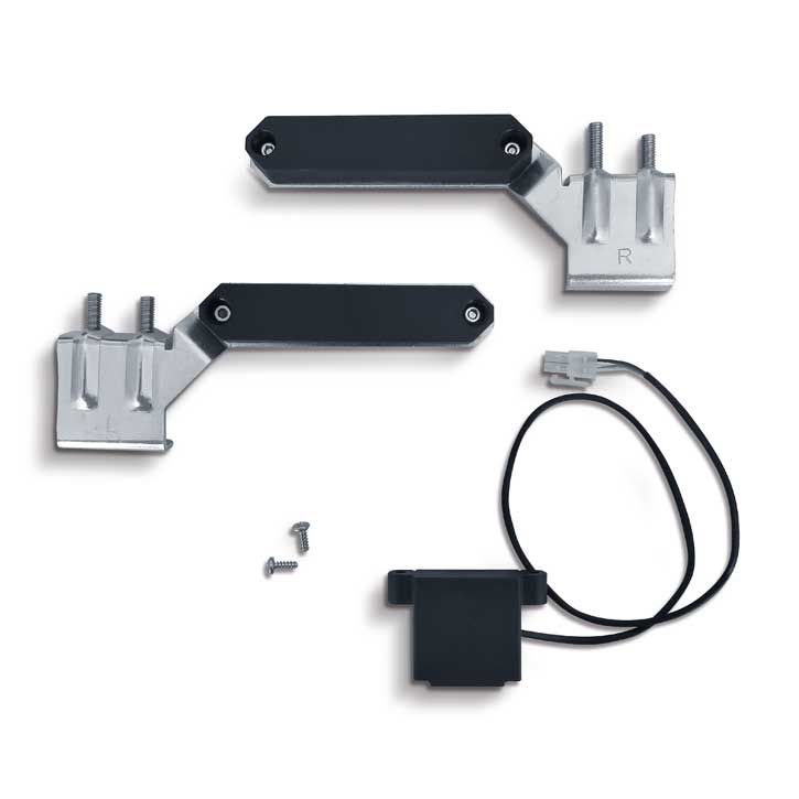 Pair of metal garage door mounting brackets with sensor cable, on white, in Prestons, New South Wales, Australia.