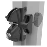 Black gate lock with key and handle assembly, mounted on a metal fence in Prestons, New South Wales, Australia